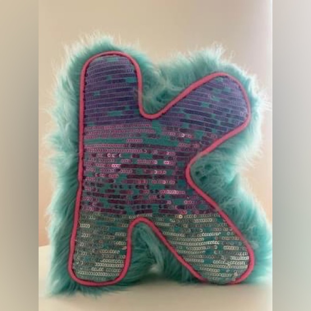 Justice “K” decorative pillow